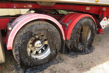 Bitumen melting on Bruce Highway south of Mackay trashes truck tyres