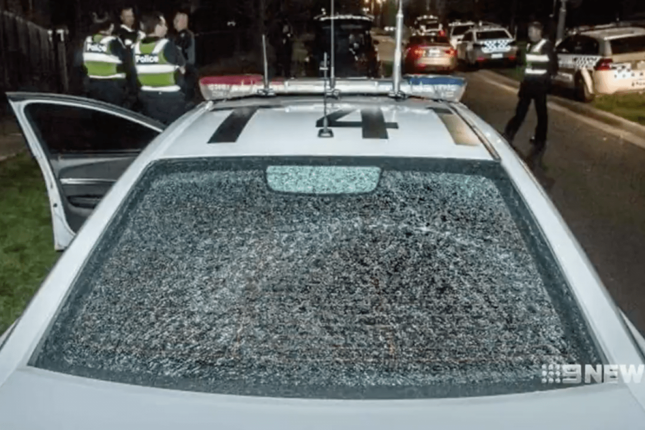 A Victoria Police car window was smashed in the incident at Taylors Hill on Wednesday night.