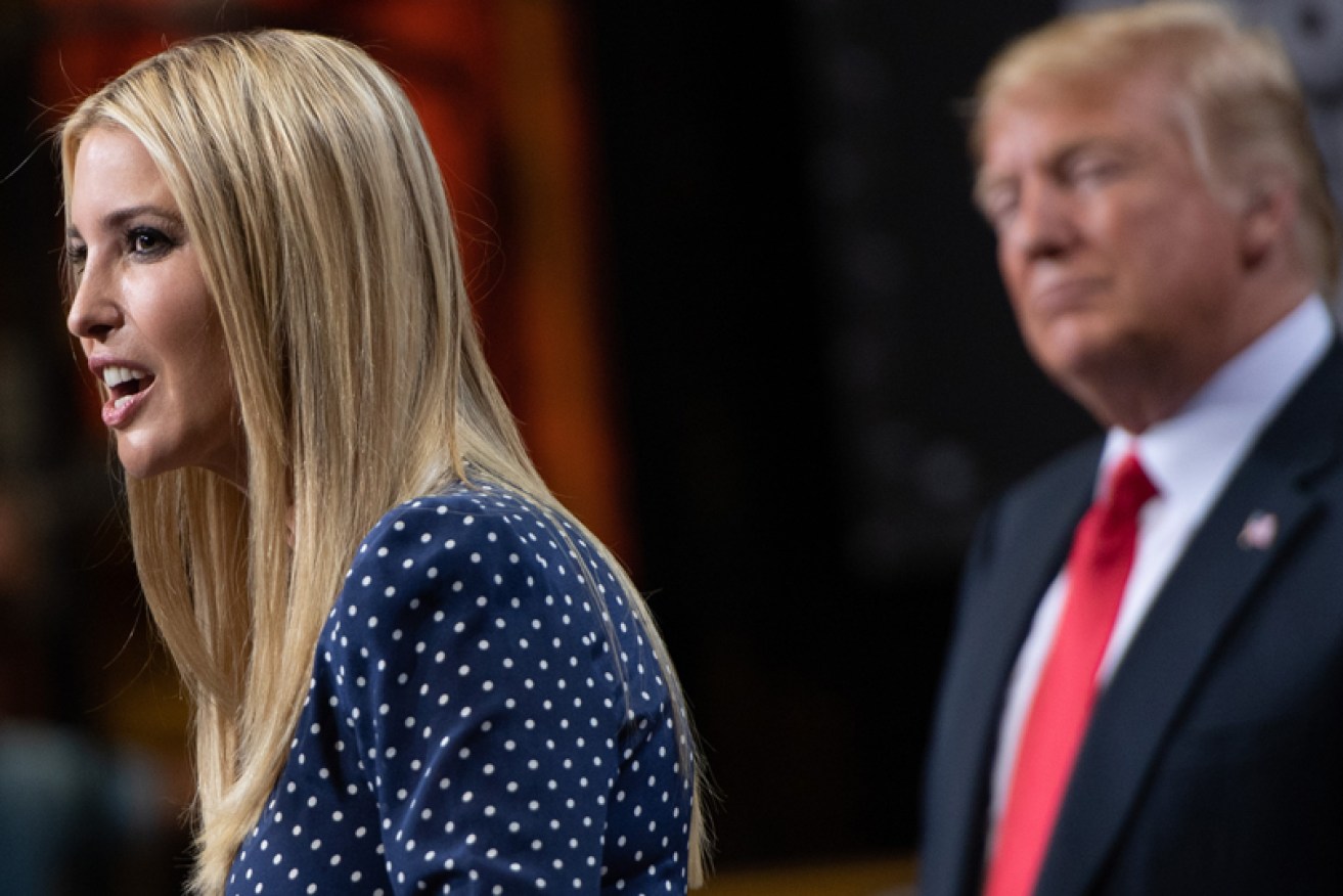 President Donald Trump listens to daughter Ivanka speak at a steel mill in Illinois on July 26.