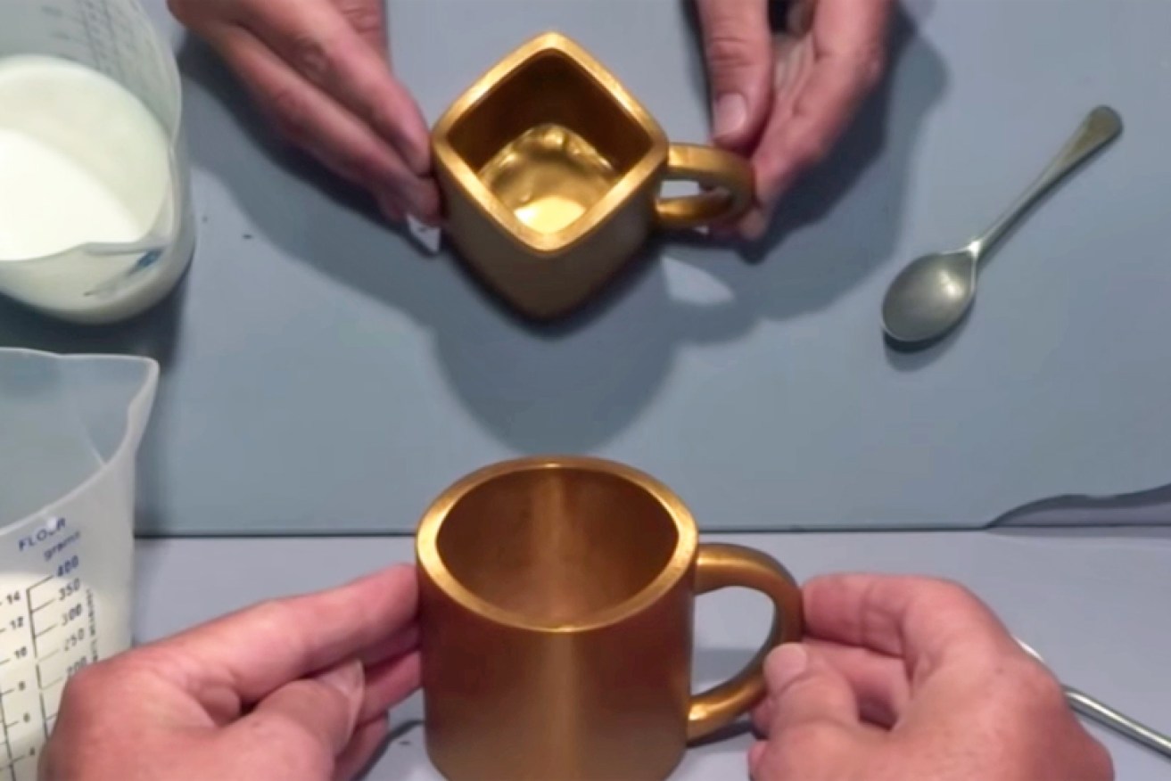 A British puzzle maker's brain-defying gold mug has gone viral.