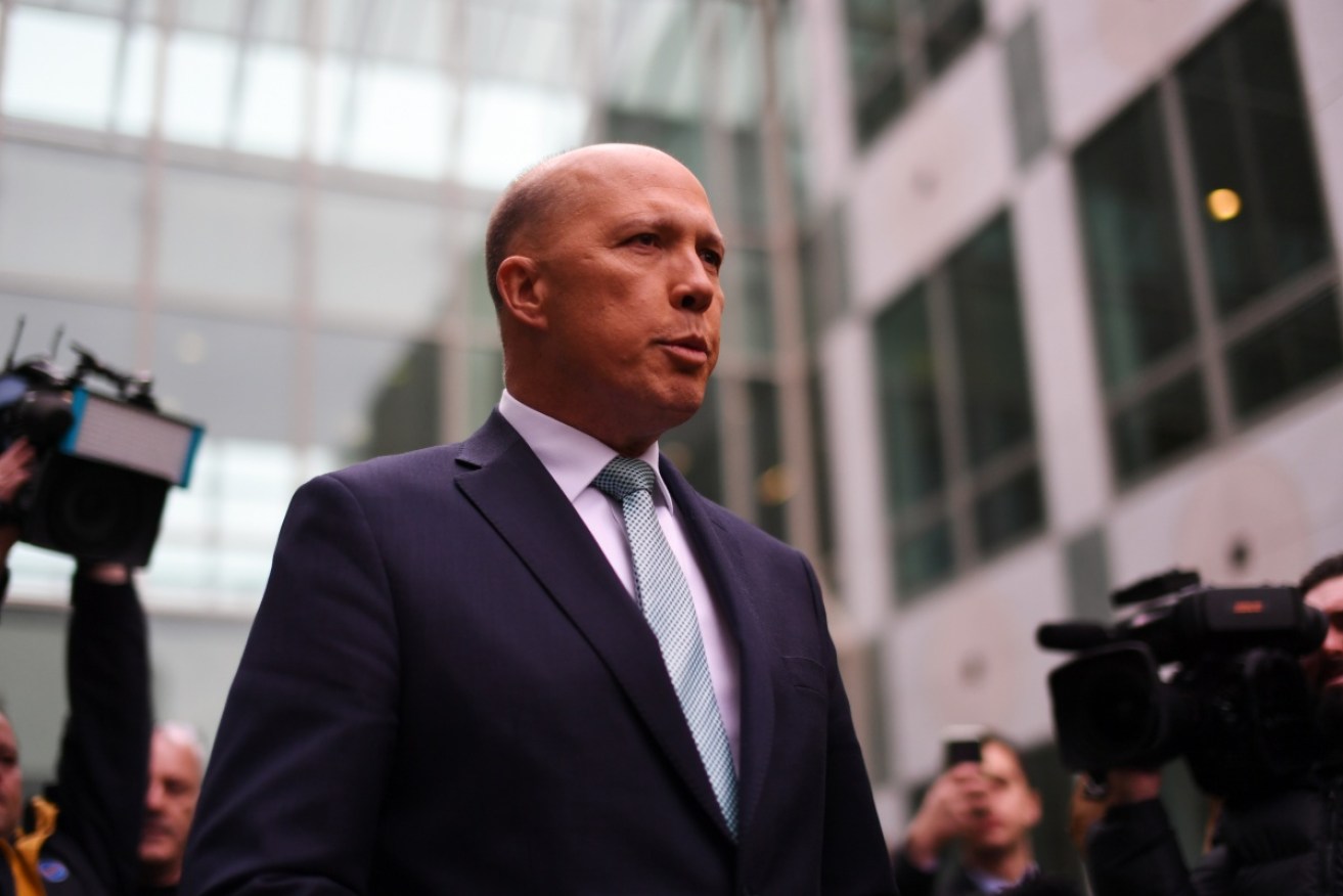 Home Affairs minister Peter Dutton blames the leadership crisis for bringing the visas scandal to light.