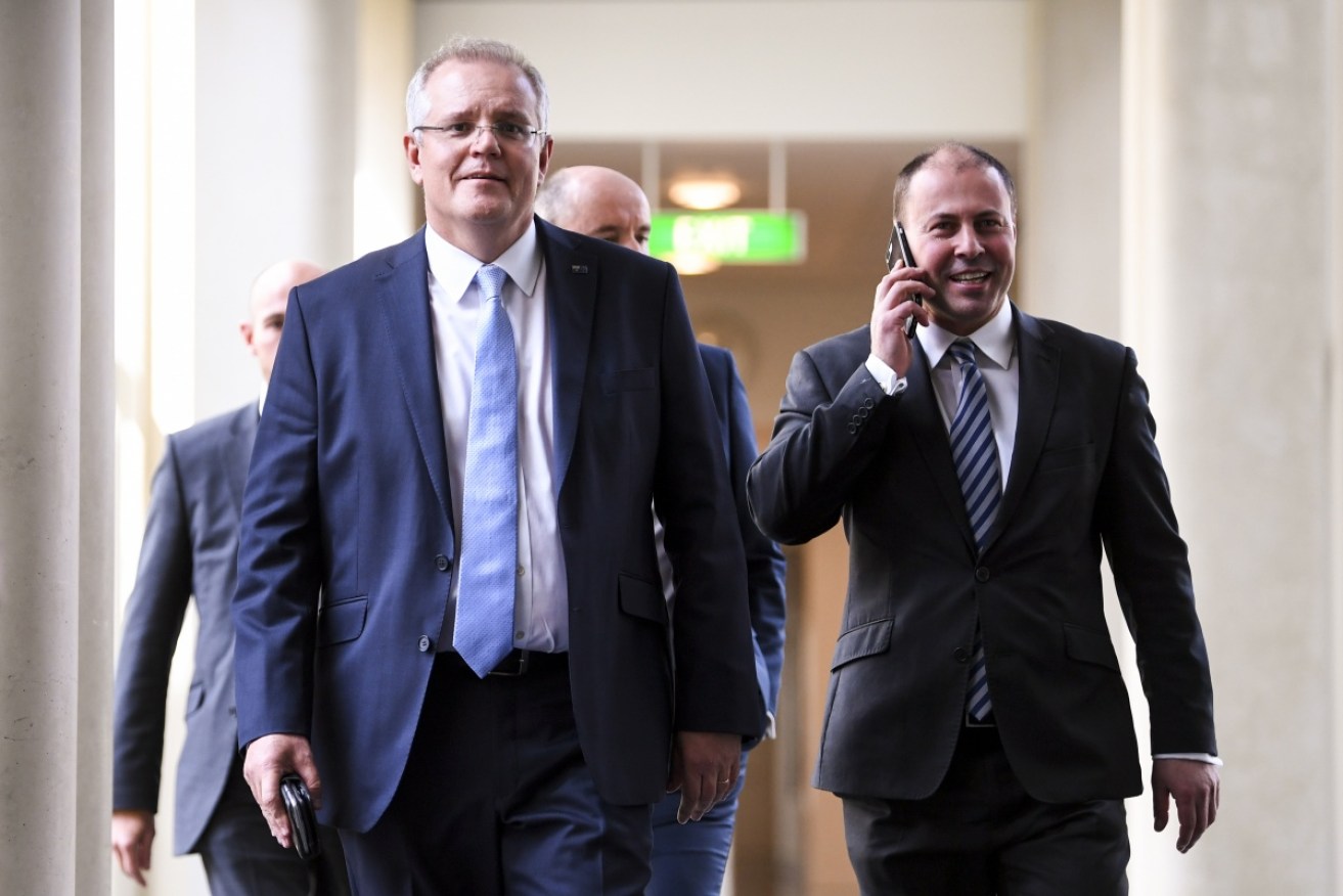 Prime Minister Scott Morrison and deputy Liberal leader Josh Frydenberg minutes after the results of the leadership spill were announced.