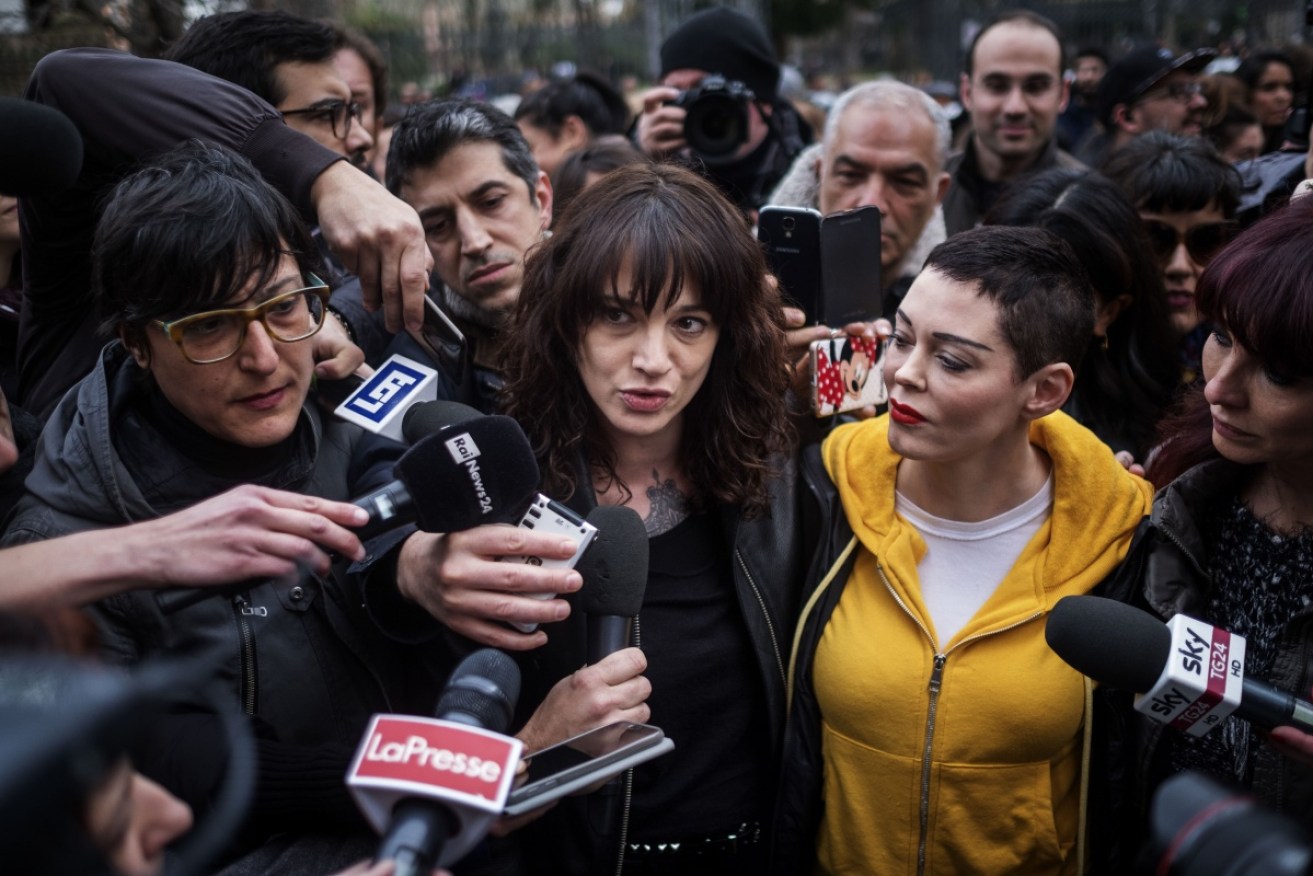 Asia Argento takes to the streets with Rose McGowan in March. 