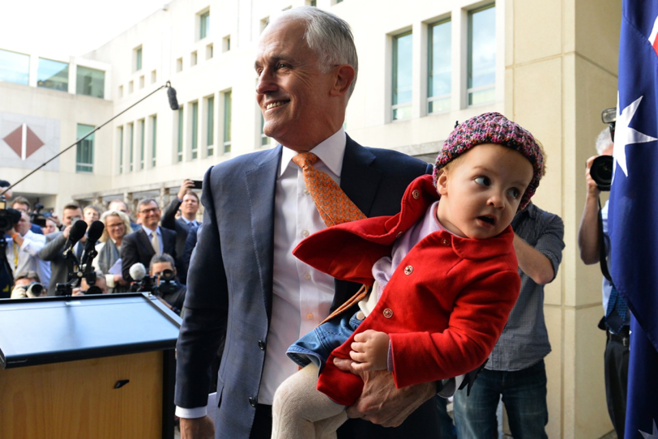 All smiles: Mr Malcolm Turnbull, with granddaughter Alice, after his final media conference. 