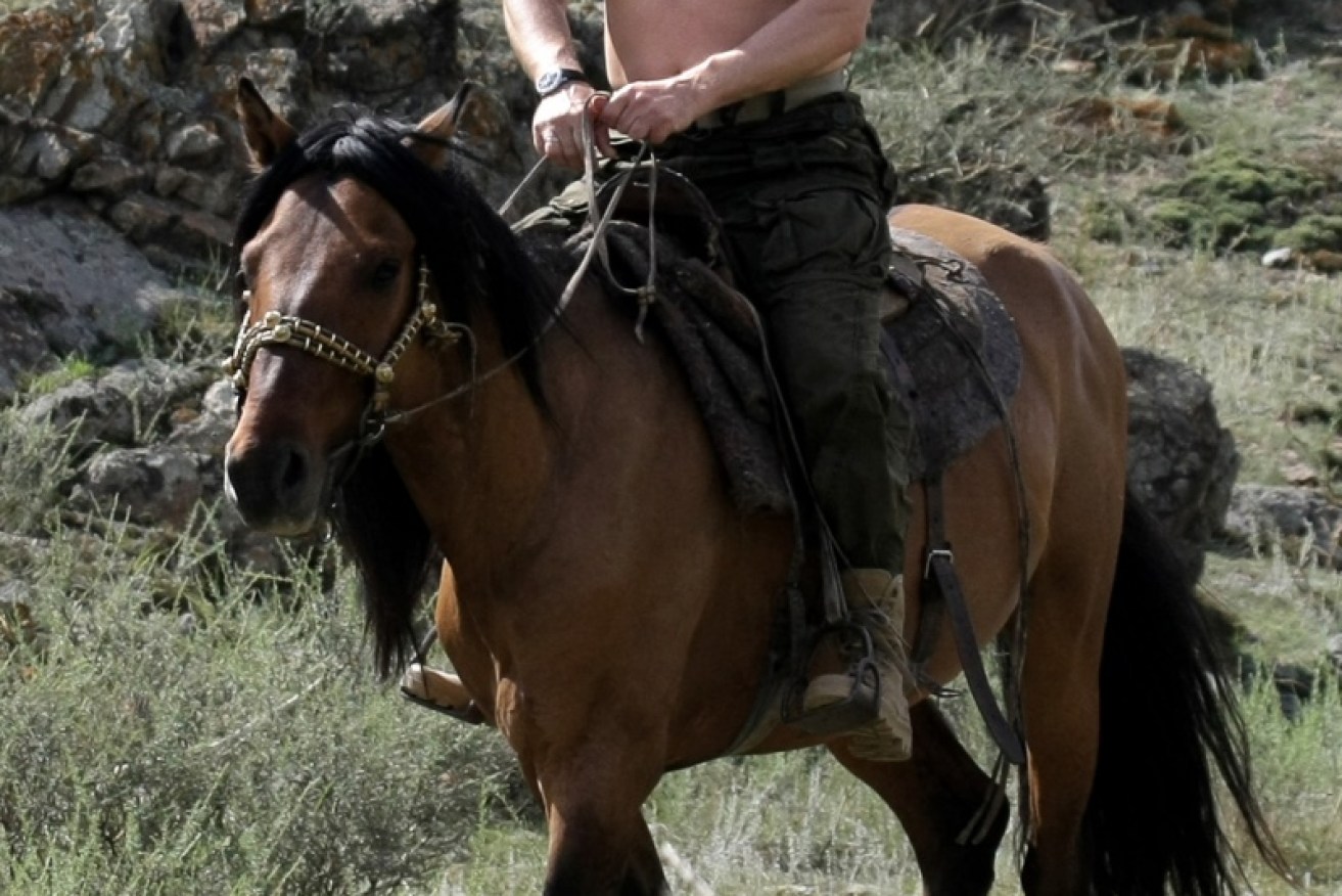 Mr Putin holidaying in Southern Siberia in 2009.