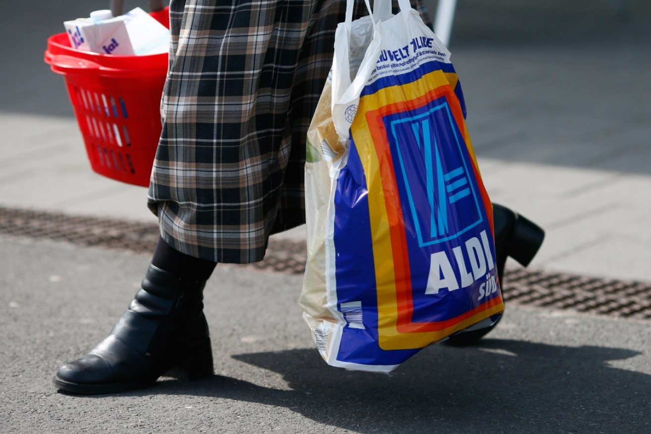 The $100,000 cash donation that helped prompt the review was allegedly handed over in an Aldi shopping bag.