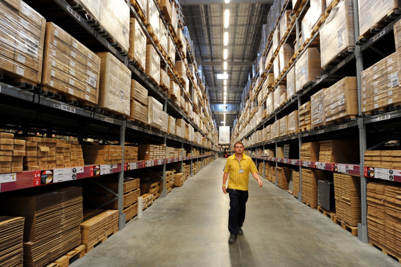 A worker walks in the massive IKEA in Tempe, Sydney.