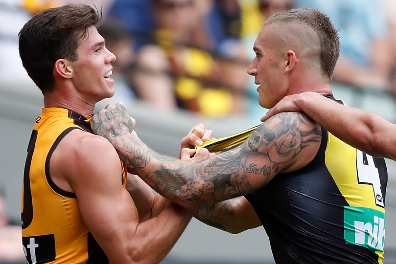 Tempers can flare when Hawks meet Tigers, but this time they're uniting for a noble cause.