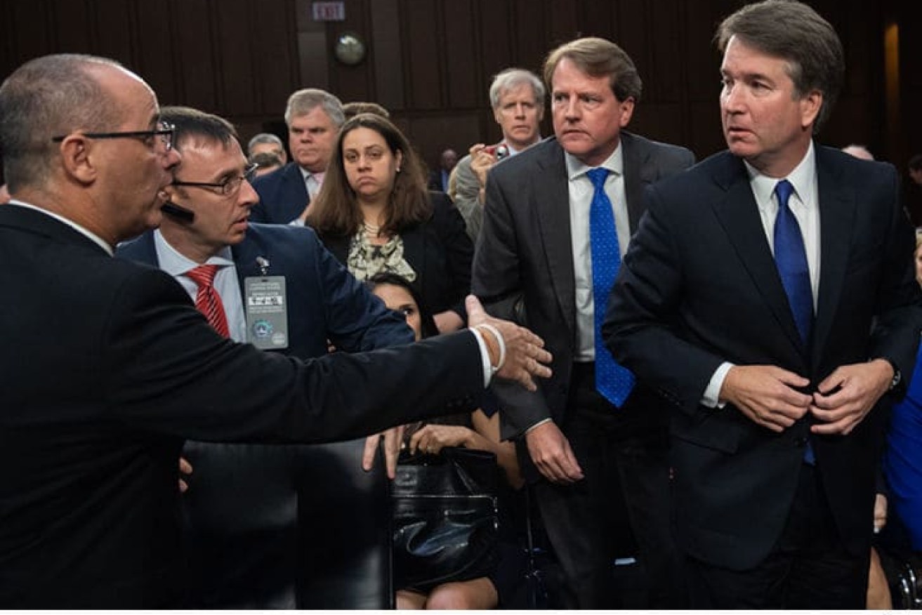 The handshake refusal came during chaotic scenes at the Senate hearing.