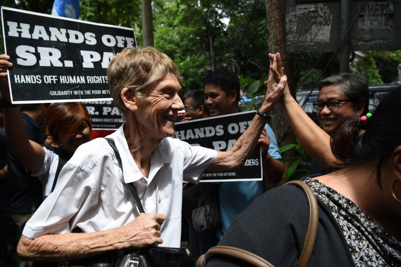 Sister Patricia Fox arrives to submit documents for her appeal at the Department of Justice in Manila on September 3.