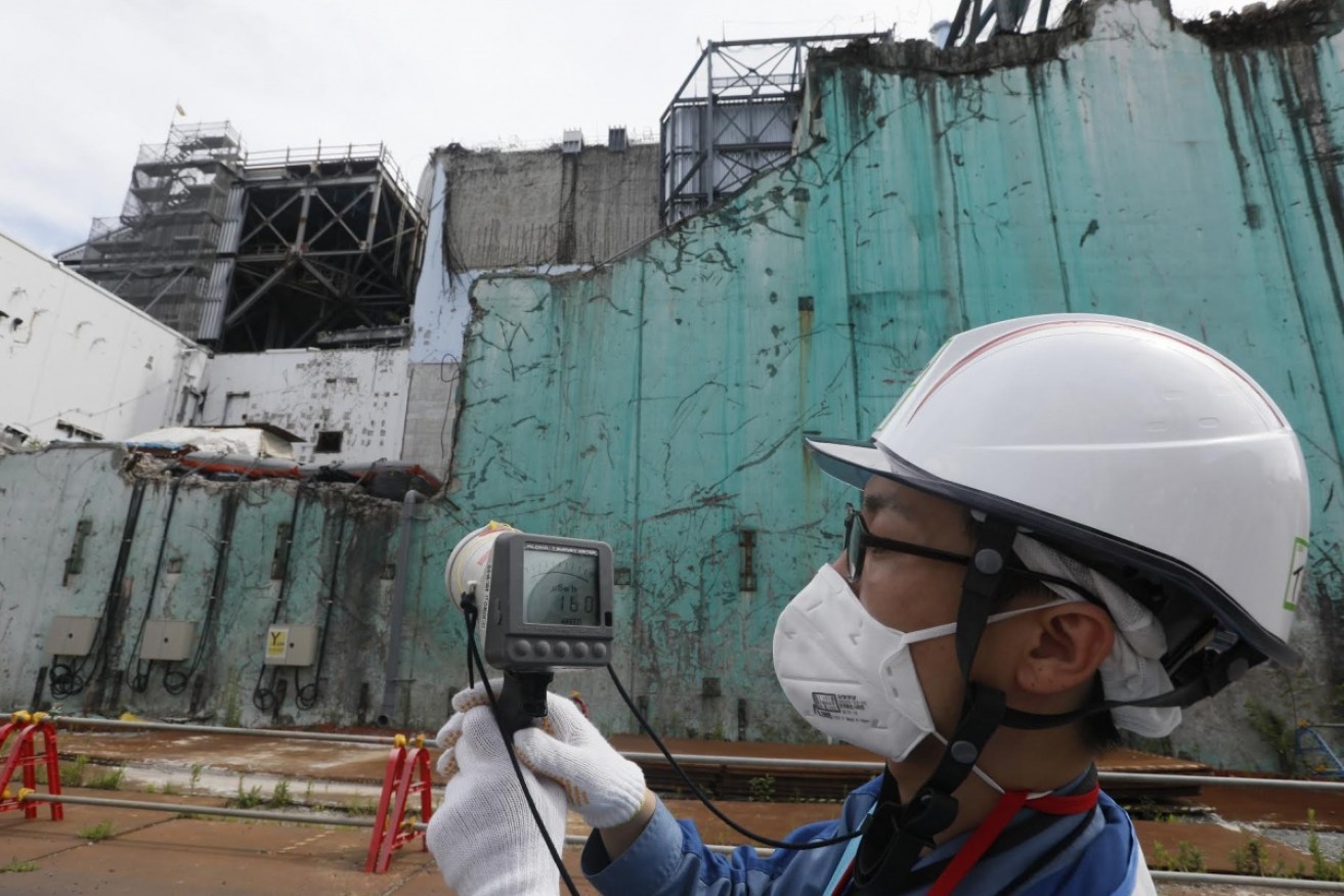 The wrecked Fukushima Daiichi nuclear power holds millions of gallons of highly radioactive water. <i>Photo: AFP/Getty</i>