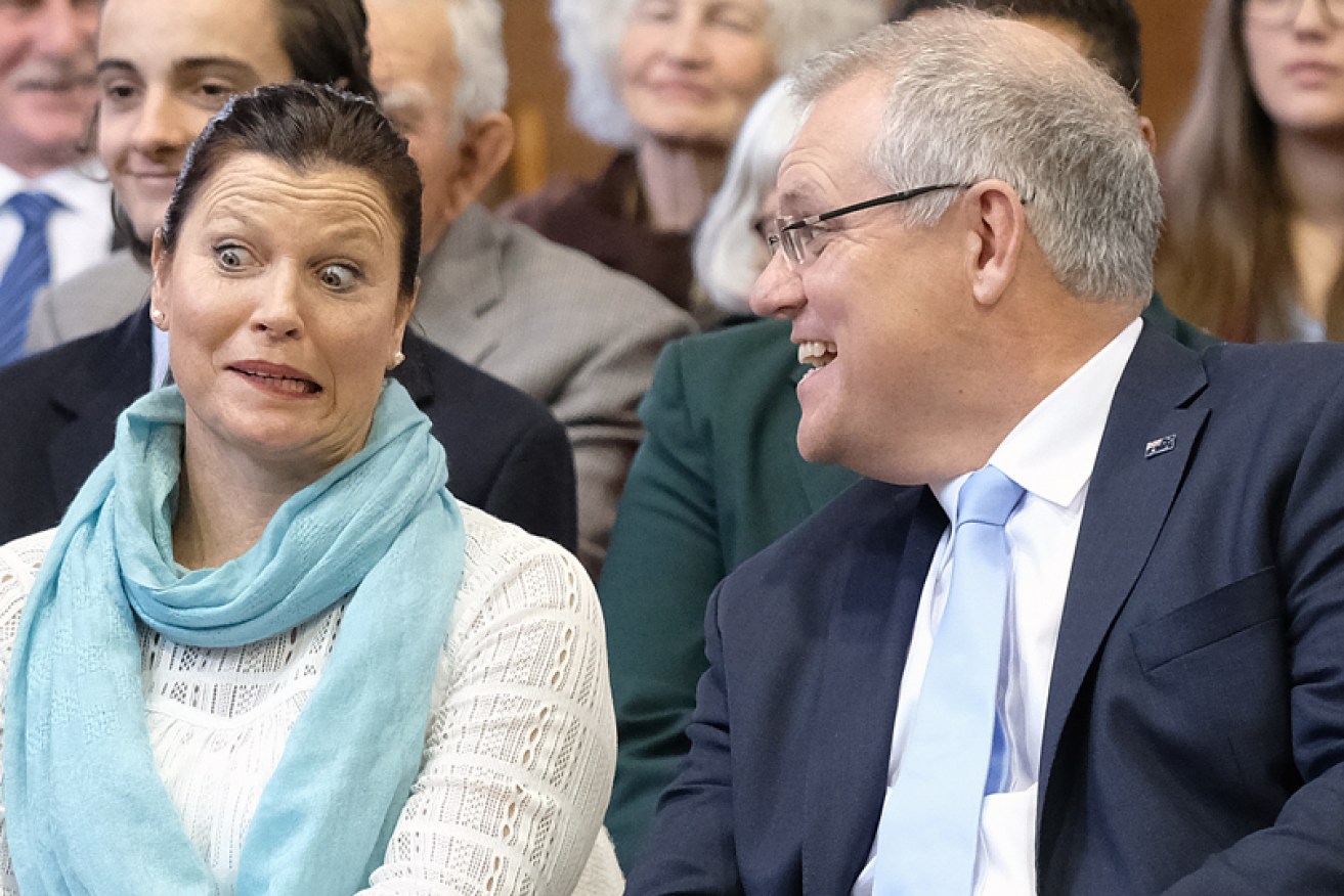 Mr Morrison jokes with wife Jenny before a speech in Albury, New South Wales, 2018.