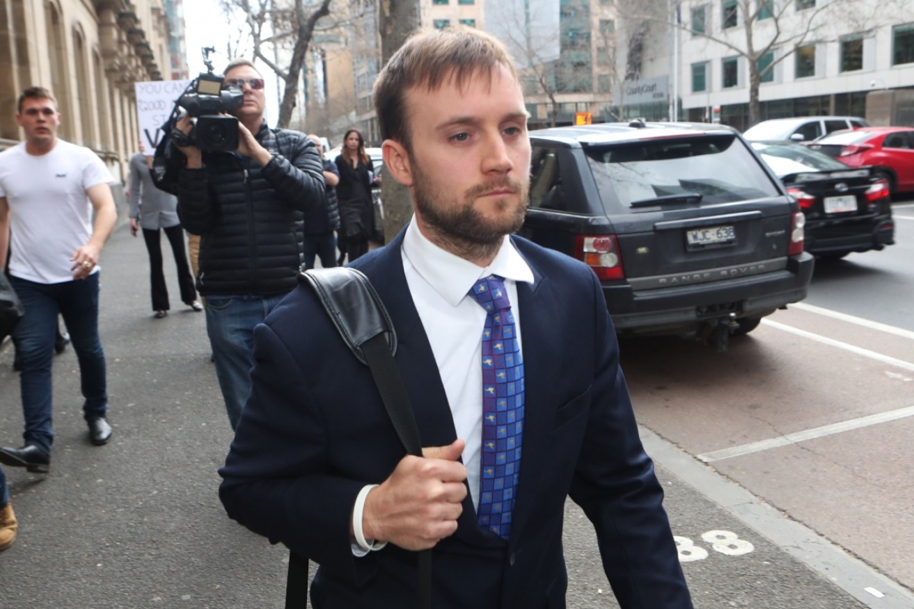 Andrew Nolch, who is accused of defacing a memorial to slain comedian Eurydice Dixon, leaves the Melbourne Magistrate court in Melbourne.