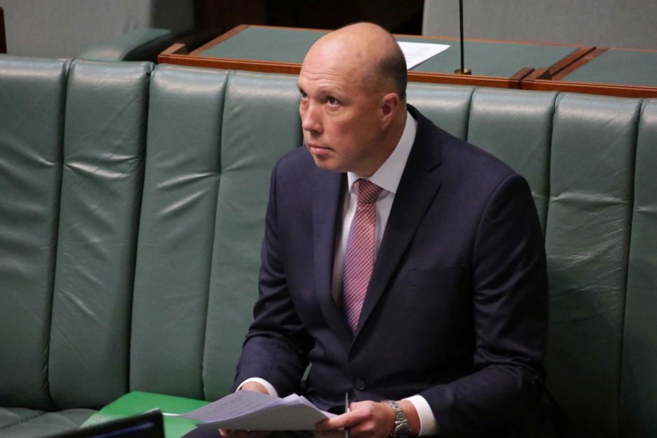 Peter Dutton has defended himself in parliament. 