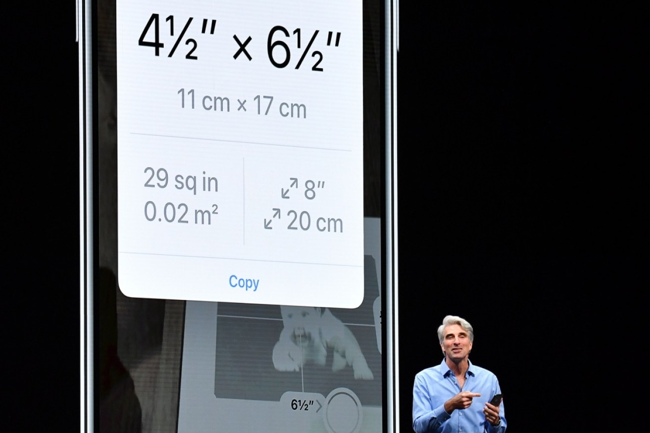 Apple's Craig Federighi speaks about the new Measuring app in June. 