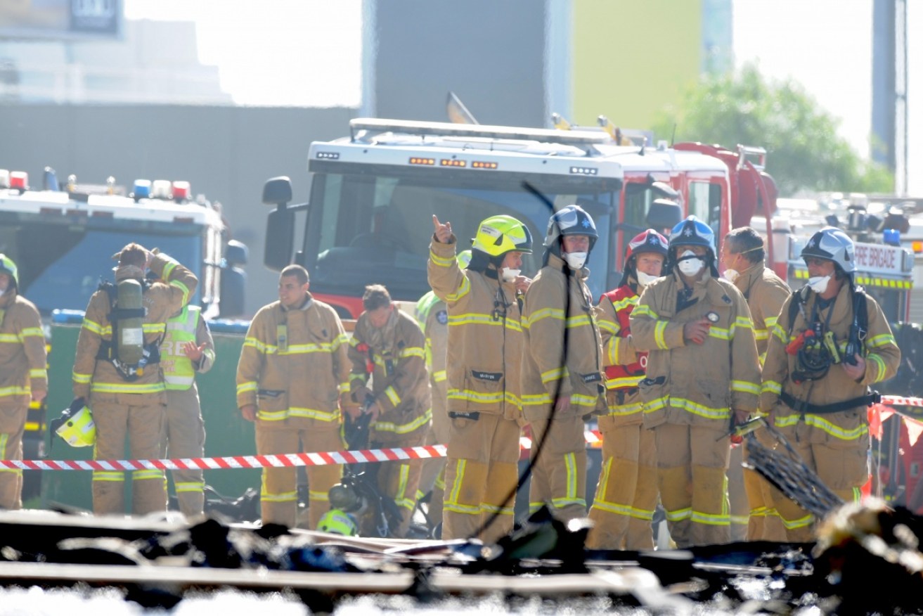 Firefighters at the scene of the fatal crash that killed five people in February 2017.