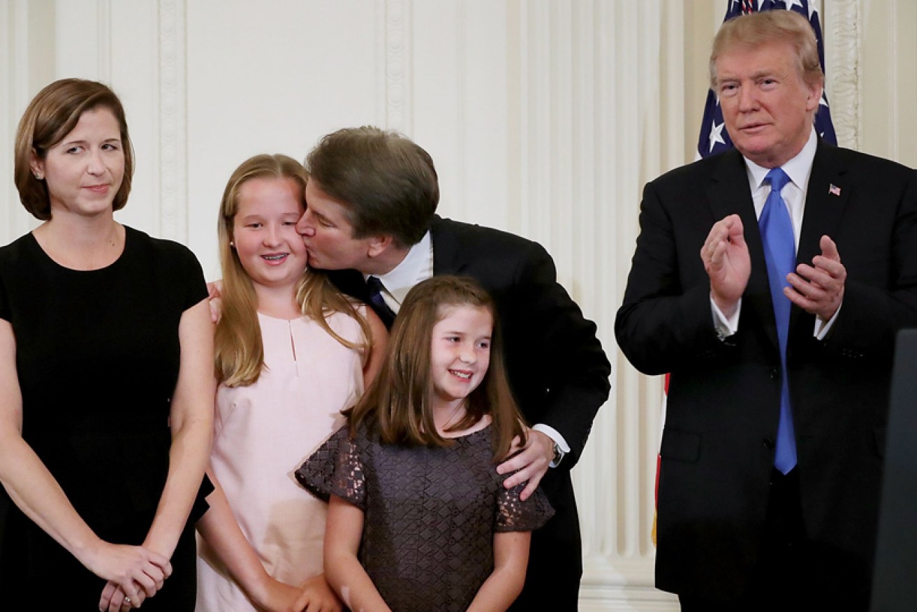 The Kavanaugh family (from left, Ashley, Margaret, Liza and Brett) with President Donald Trump on July 9.