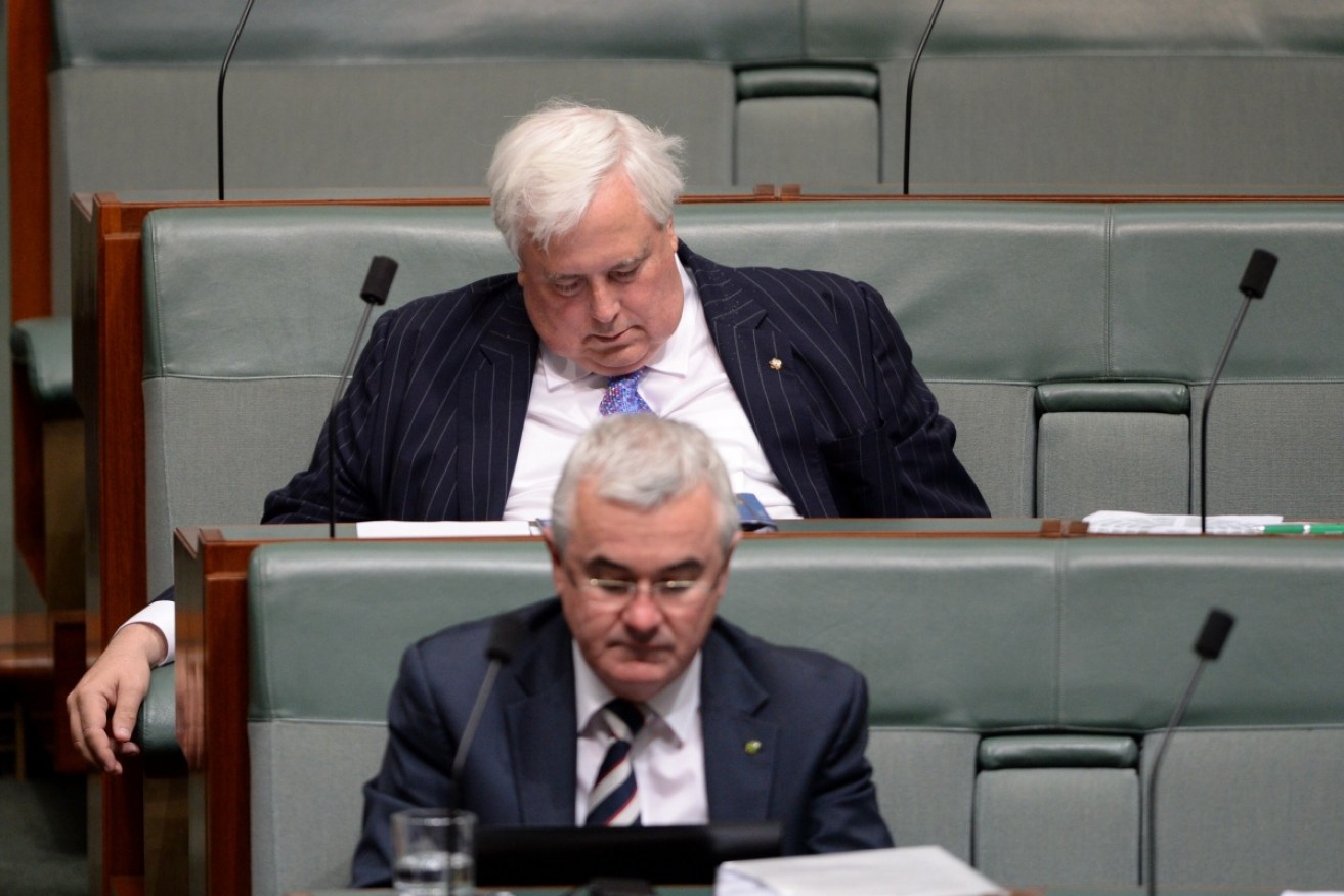 A long night of debate gets to then-Member for Fairfax Clive Palmer in May 2014.
