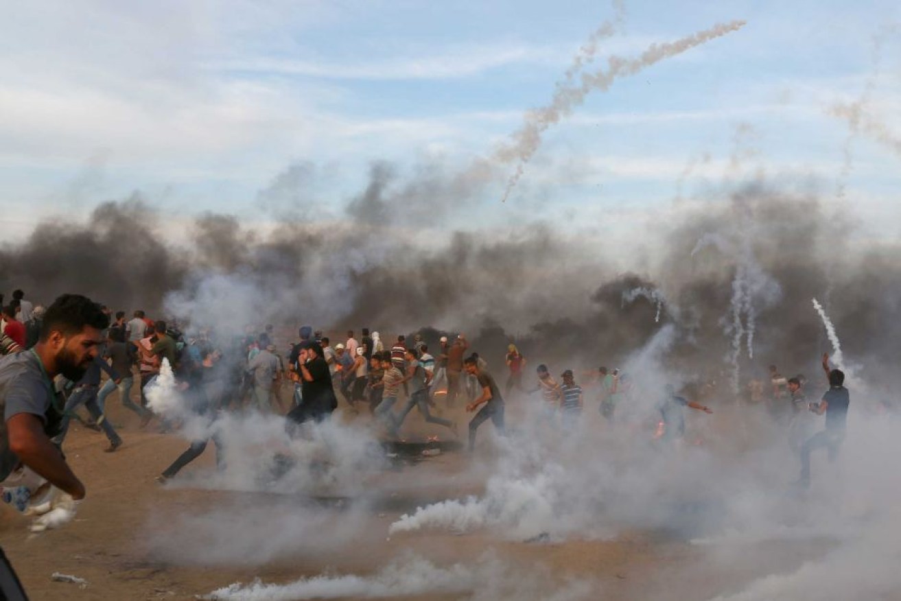 Militants are amongst Palestinian protesters at Gaza’s border with Israel.