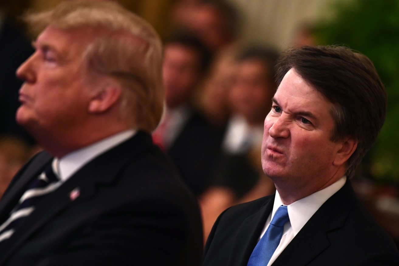 Brett Kavanaugh watches as President Donald Trump  introduces to the new Supreme Court Justice at a White House ceremony. 