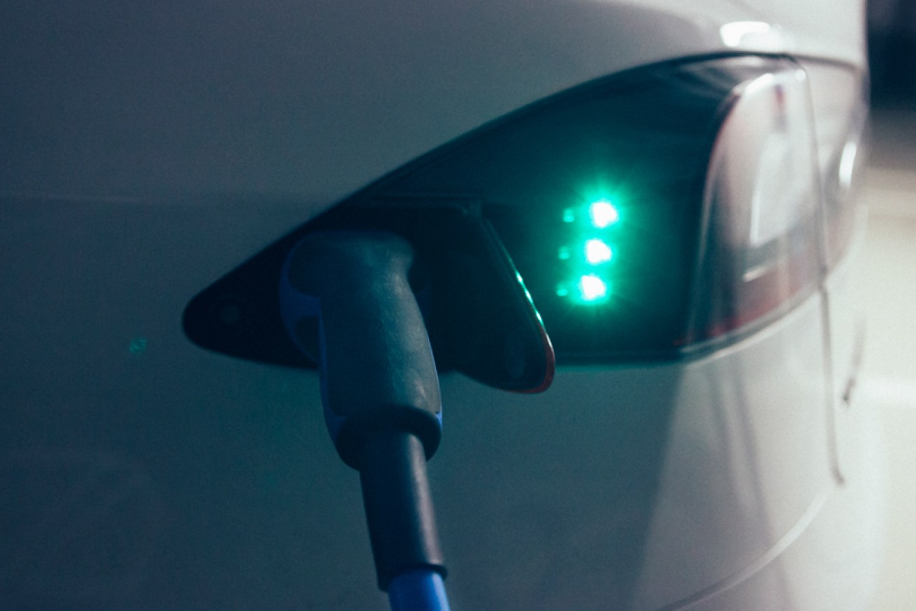 Electric cars will need subsidies to compete, car researcher says.