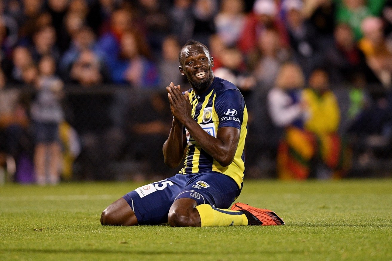 The Jamaican sprinter said last month he wouldn't call himself a footballer until he signed a contract with Central Coast Mariners.