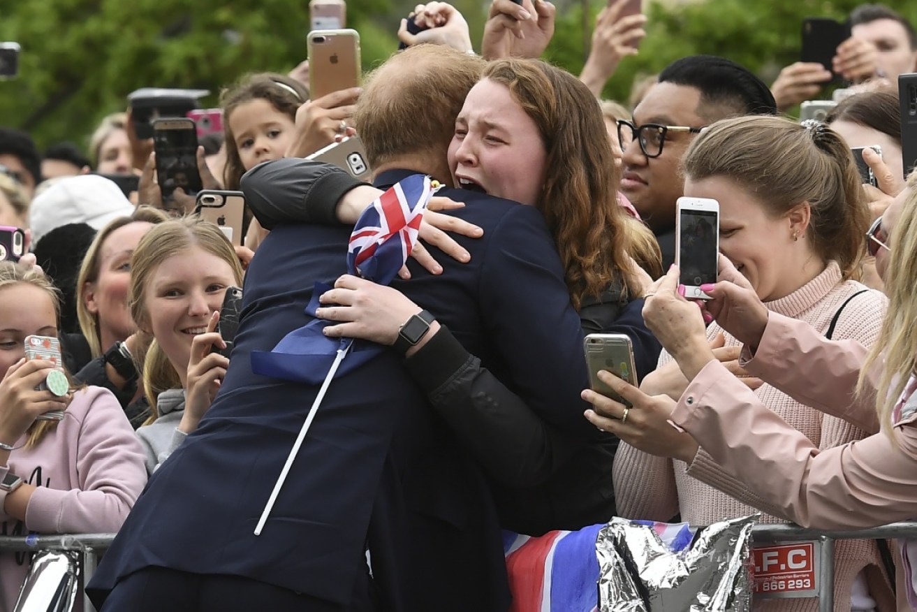 An emotional India Brown gets a special moment with Prince Harry.