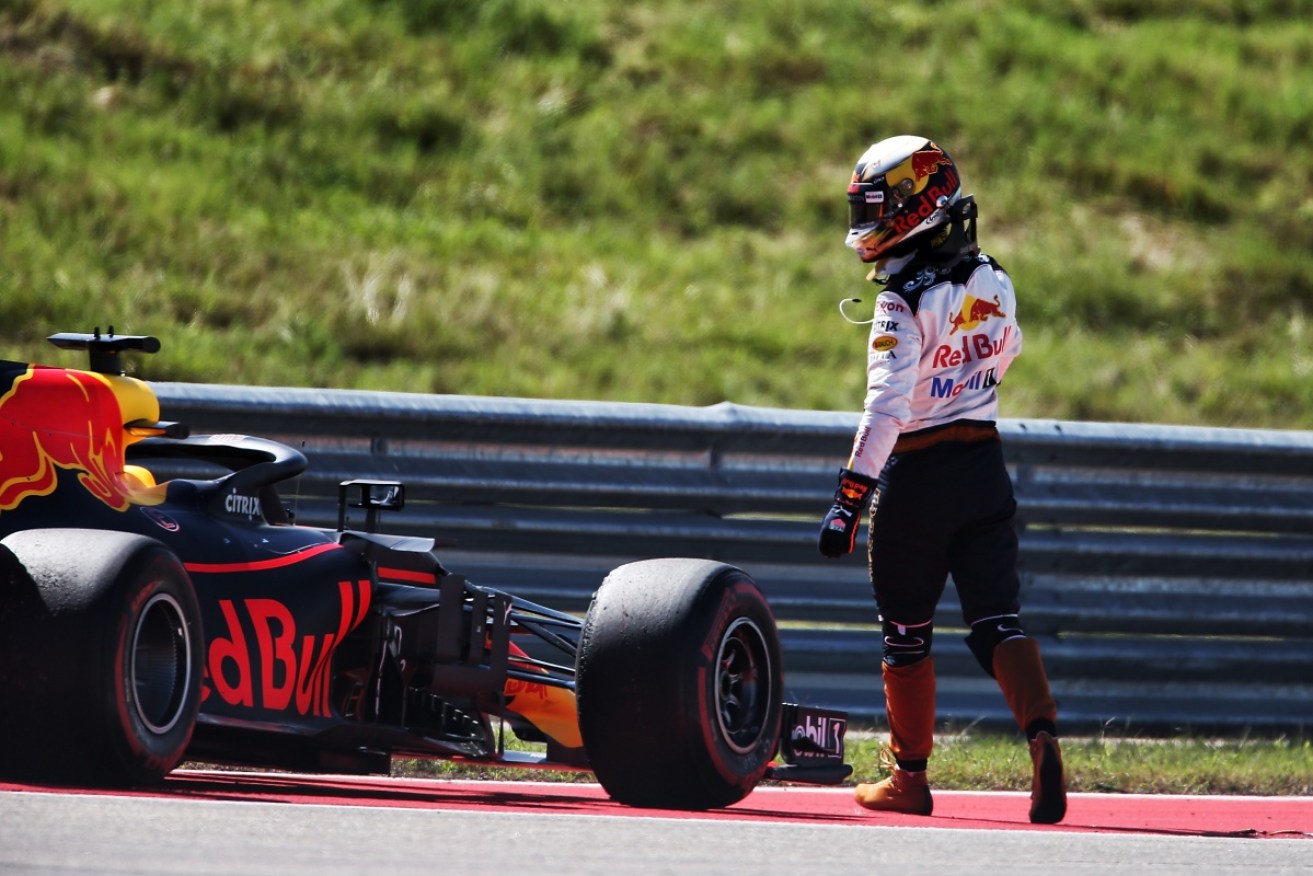 Daniel Ricciardo leaves his stricken Red Bull on the side of the track at Austin. 