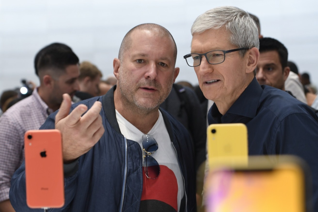 Apple chief design officer Jony Ive and CEO Tim Cook inspect the iPhone XR on September 12 in Cupertino, California.
