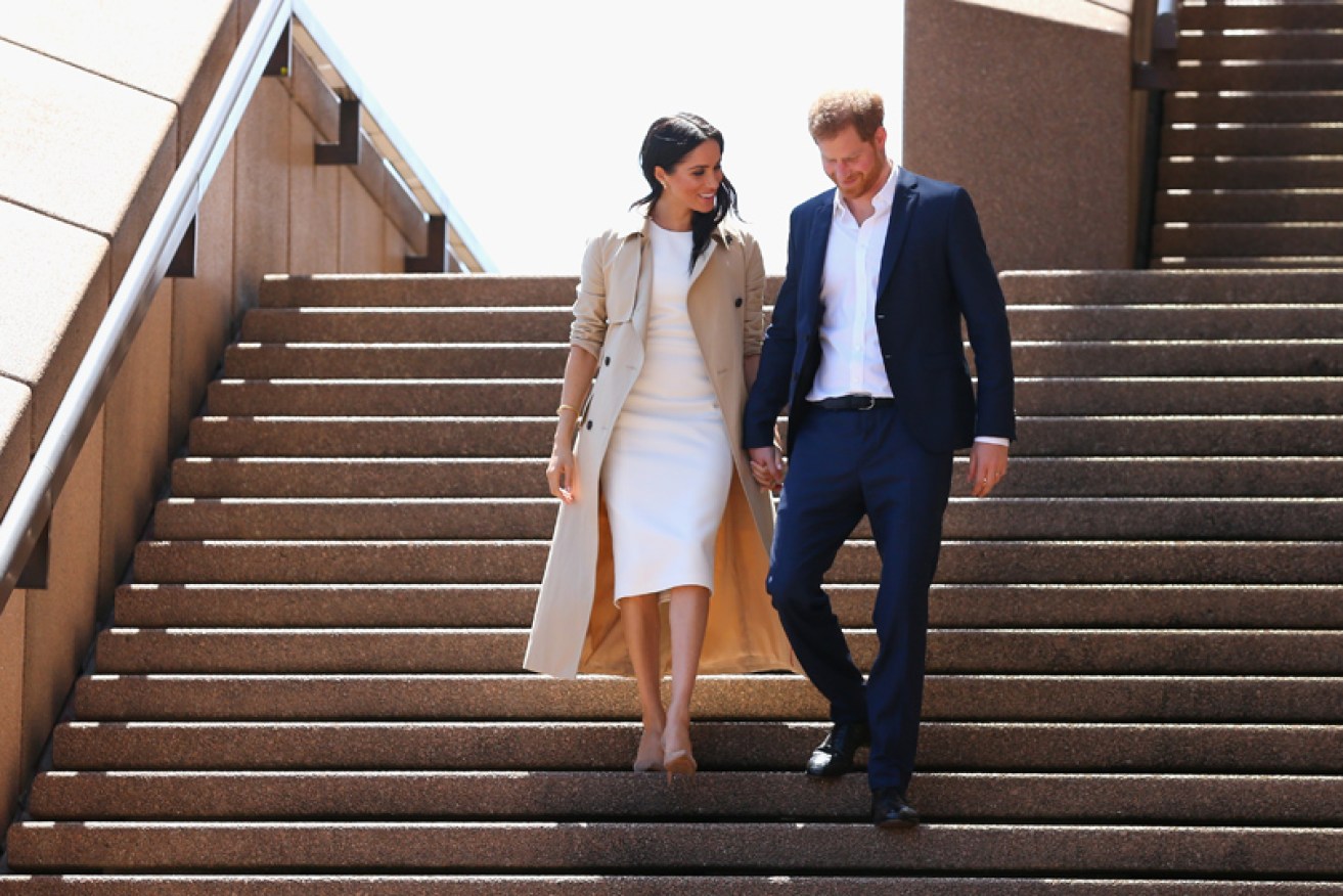 Style queen Meghan Markle with her matchy-match husband Prince Harry in Sydney on October 16.