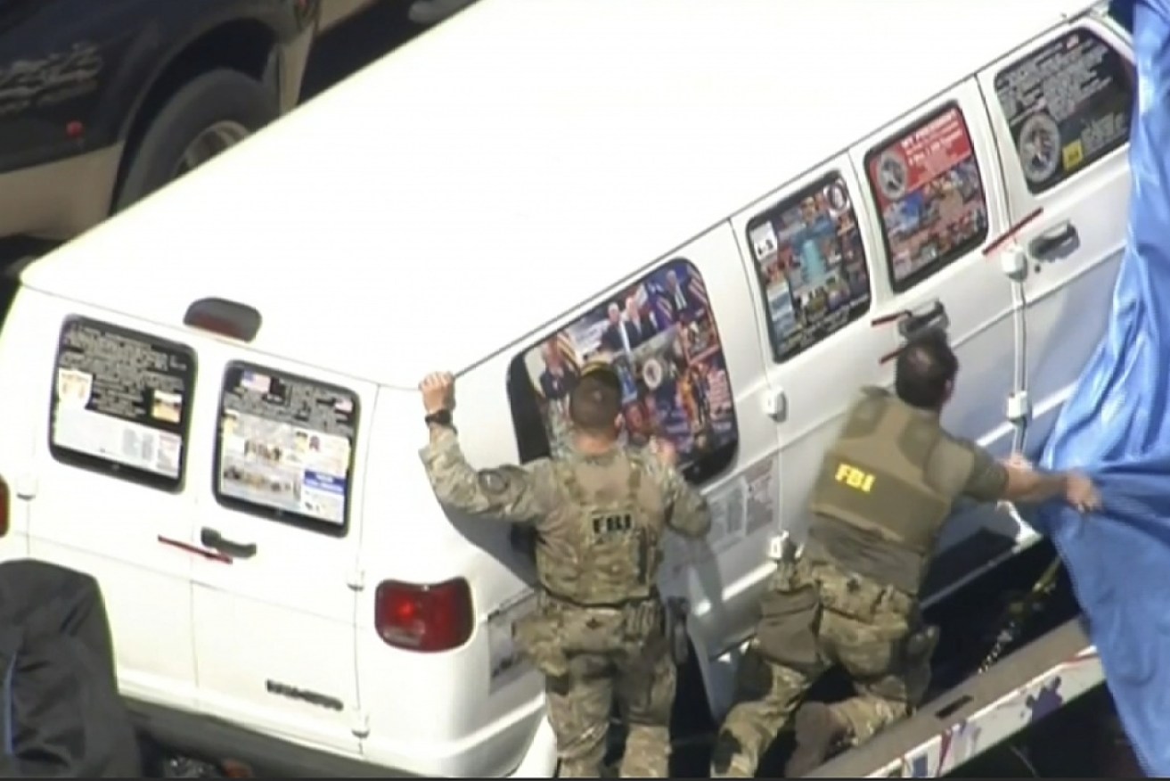 Authorities swoop on a white van covered in pro-Republican stickers in relation to a bomb scare in the United States.