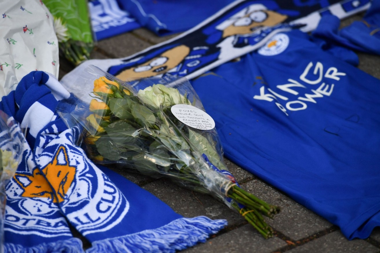 Fans leave tributes for the five people who were lost in the fatal helicopter crash.
