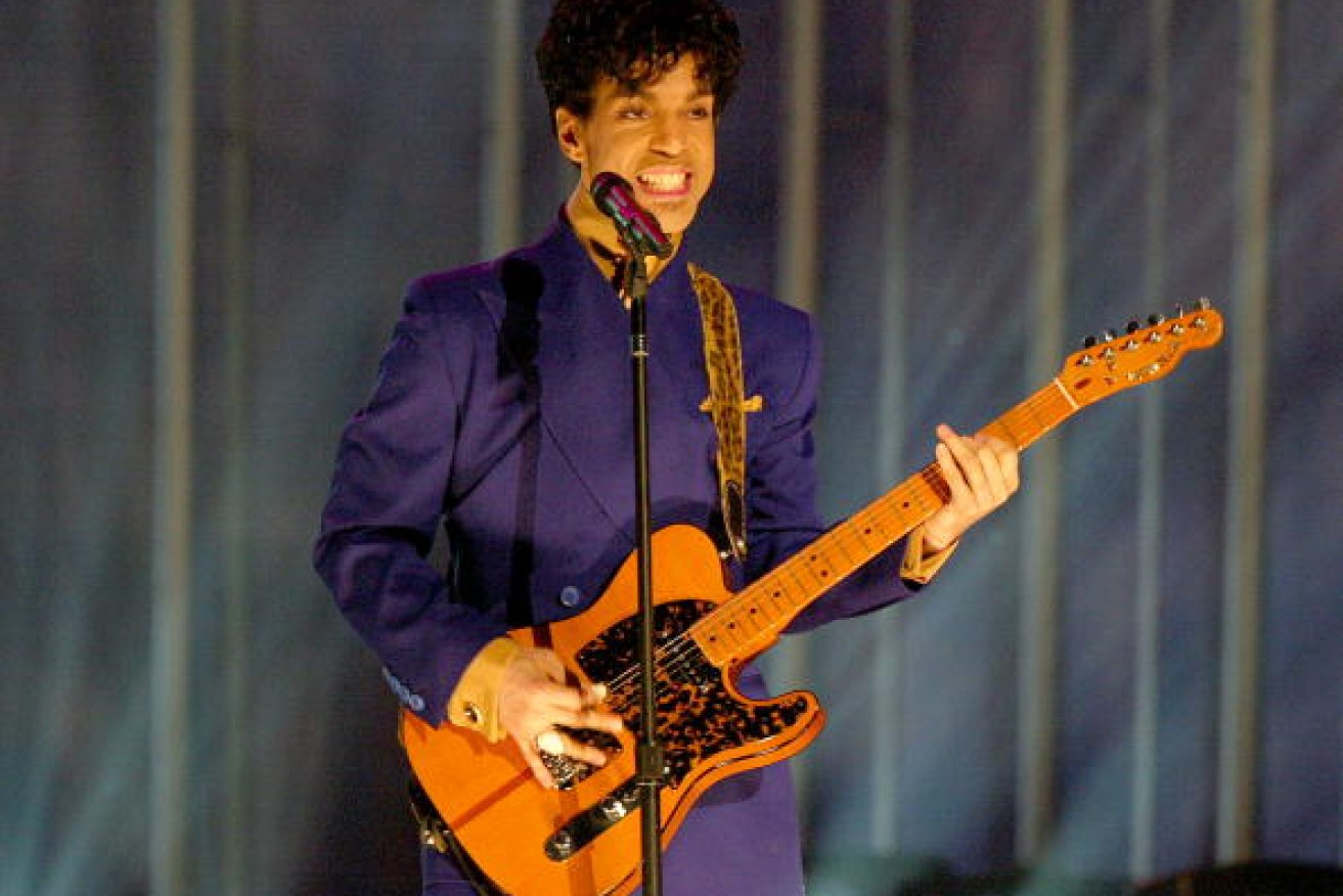Prince performs at the 46th Annual Grammy Awards in 2004.