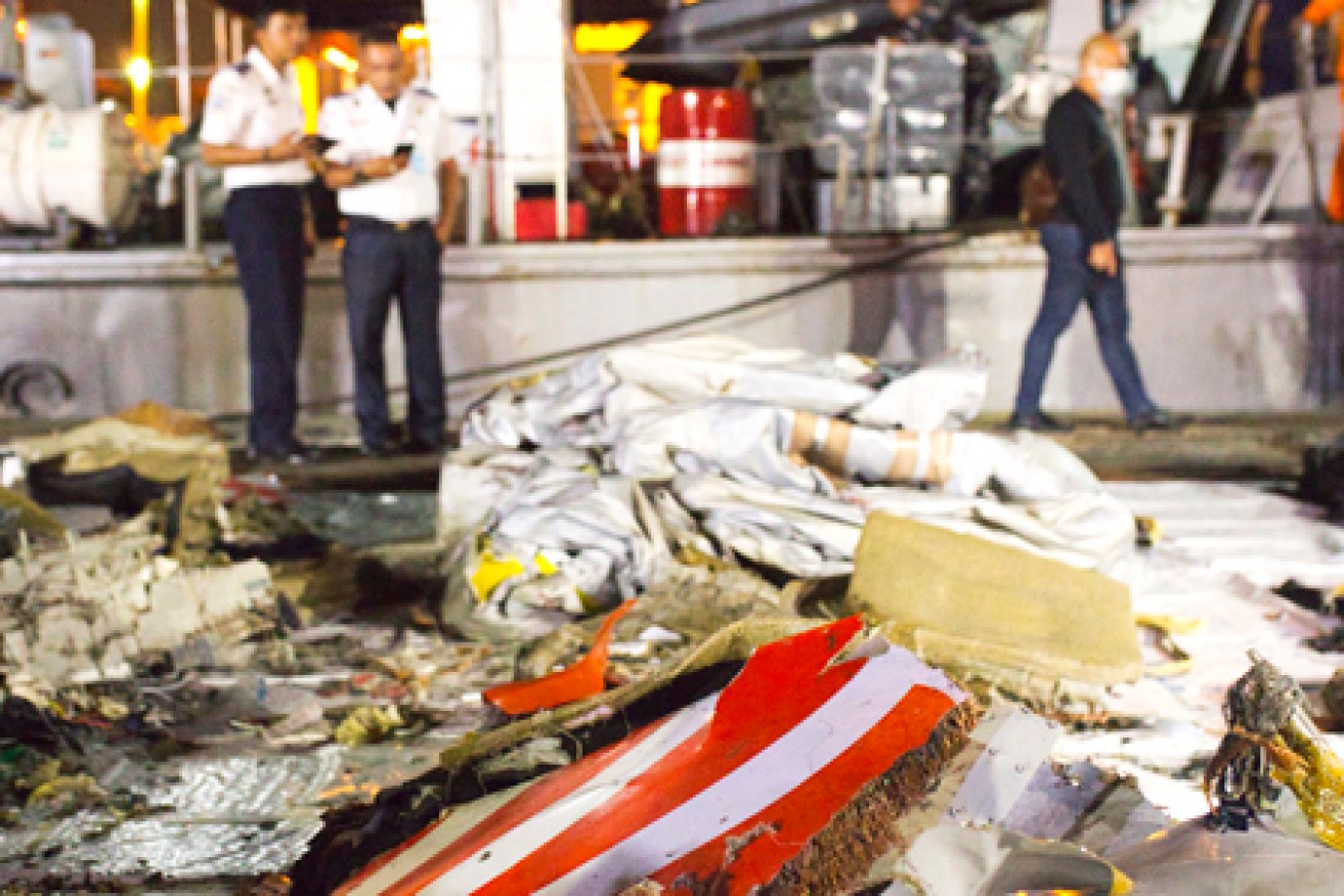 Wreckage from Lion Air flight JT 610 lies at the Tanjung Priok port.