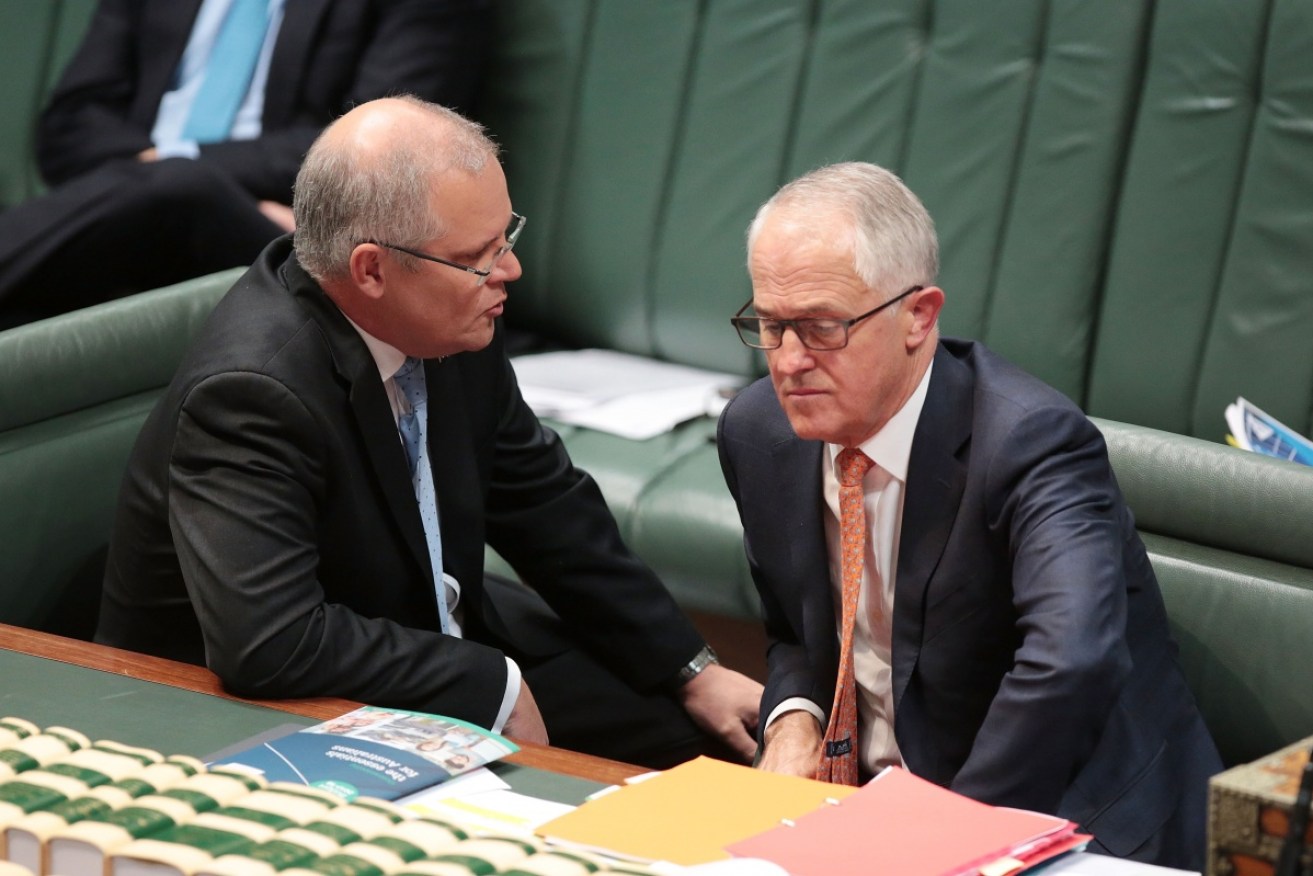 Scott Morrison and Malcolm Turnbull (seen here in happier times) are at odds over Mr Turnbull's visit to Indonesia.