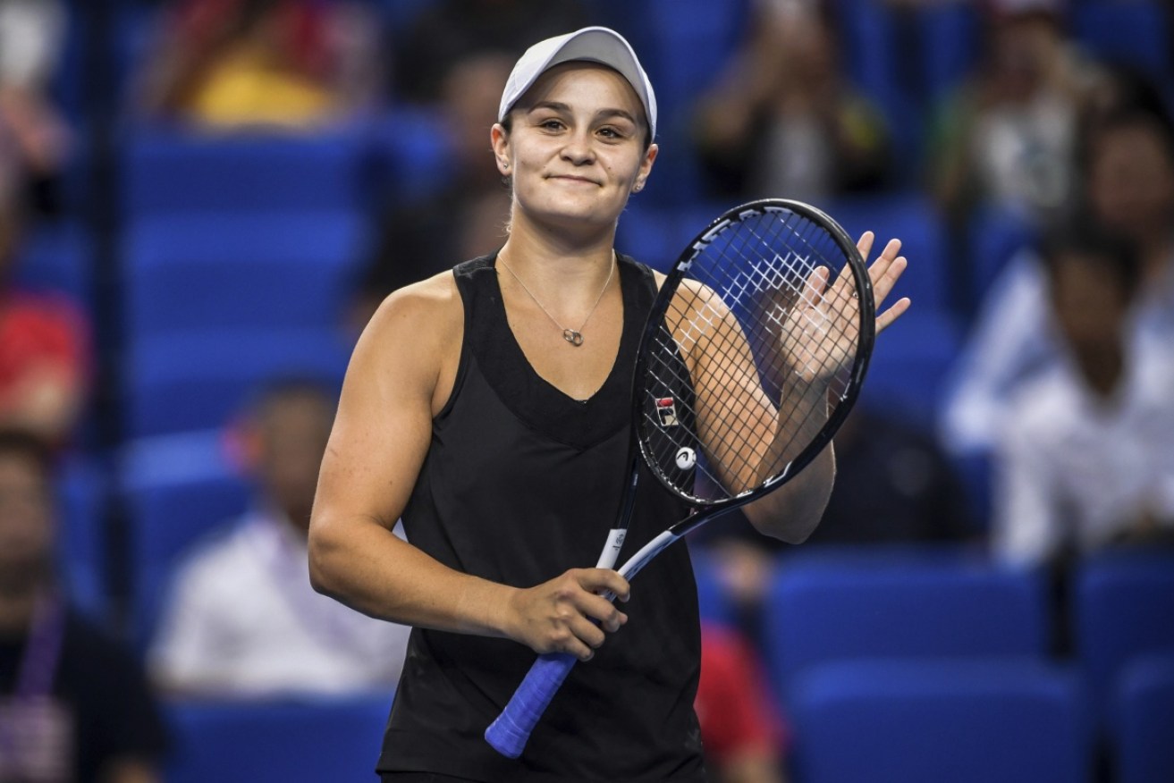 Barty celebrates after defeating France's Caroline Garcia in Zhuhai, southern China.