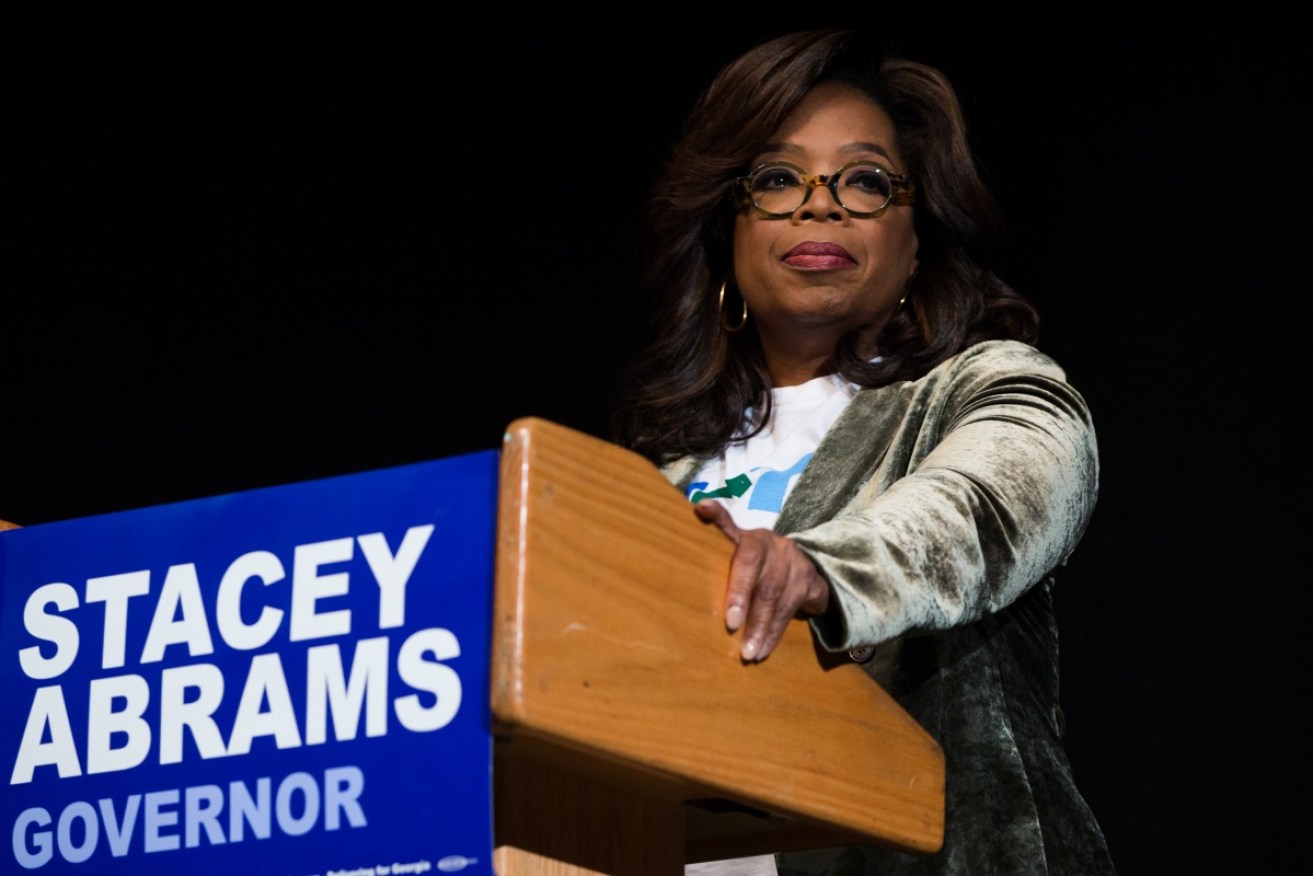 Oprah Winfrey has called out the racist robocalls, hours before the midterms vote. 