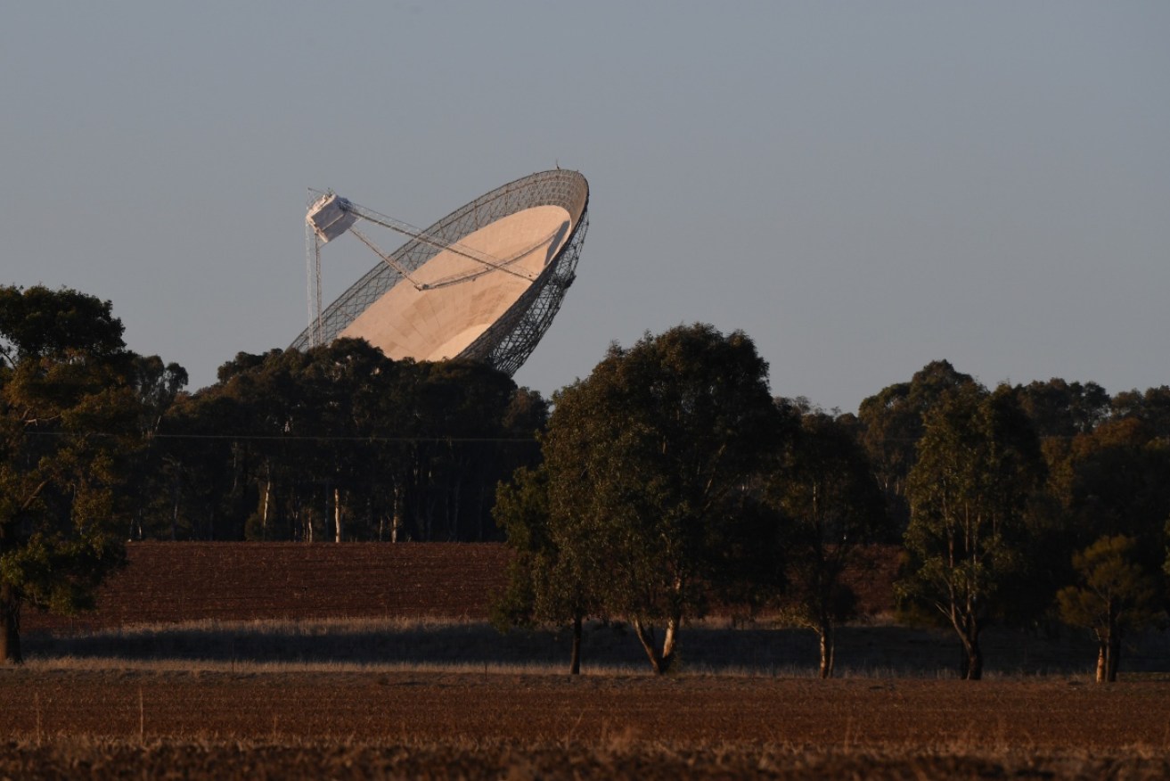 The Parkes Radio Telescope is one way Australian scientists are scanning the universe for signs of alien life.