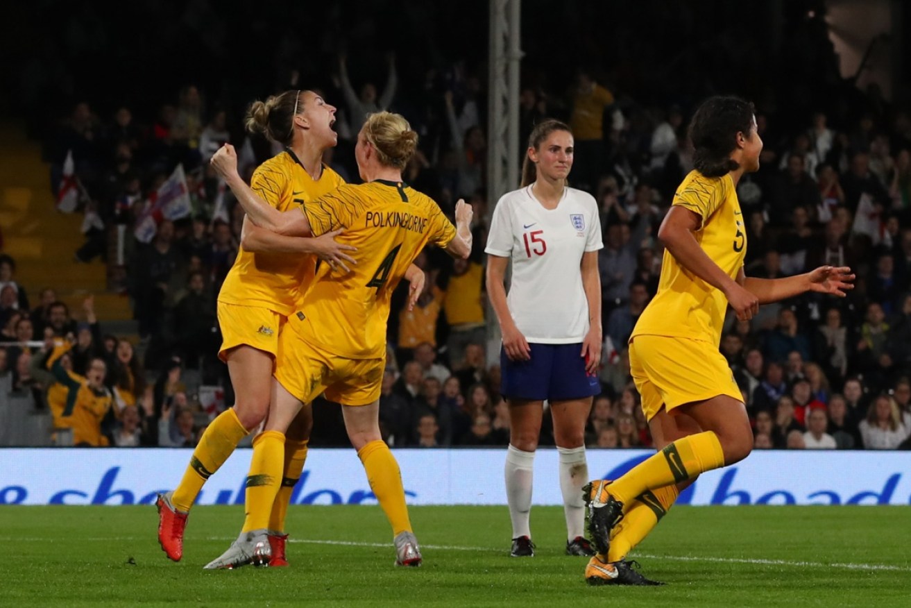 Clare Polkinghorne celebrates the Matildas equaliser against England in October