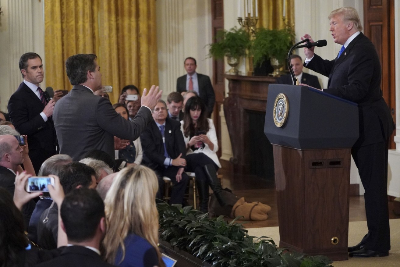US President Donald Trump gets into a heated exchange with CNN chief White House correspondent Jim Acosta during a post-election press conference