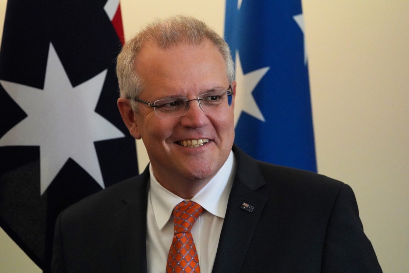 Scott Morrison has decided to not cut $4.5 million in funding to Foodbank.
