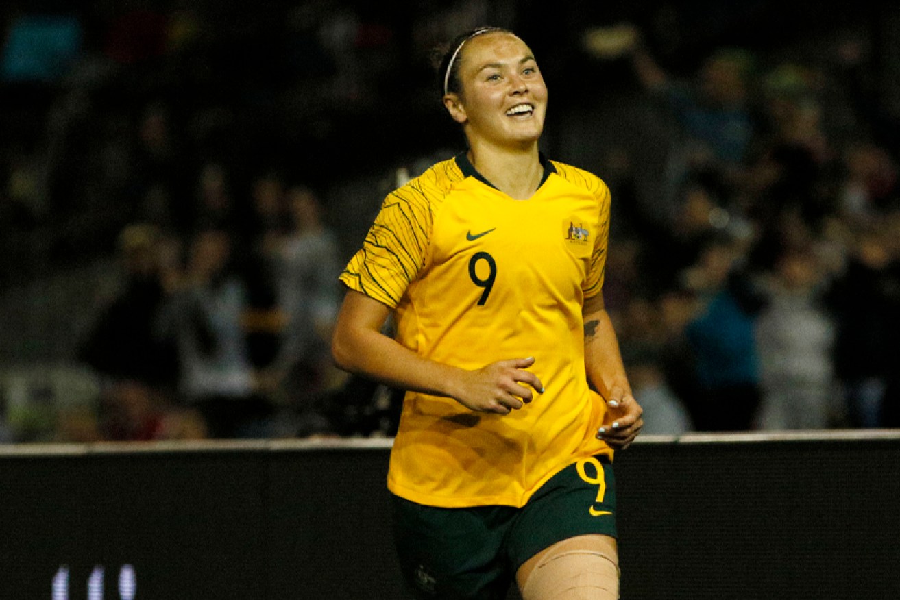 Caitlin Foord of the Matildas celebrates after scoring one of her three goals in Newcastle.