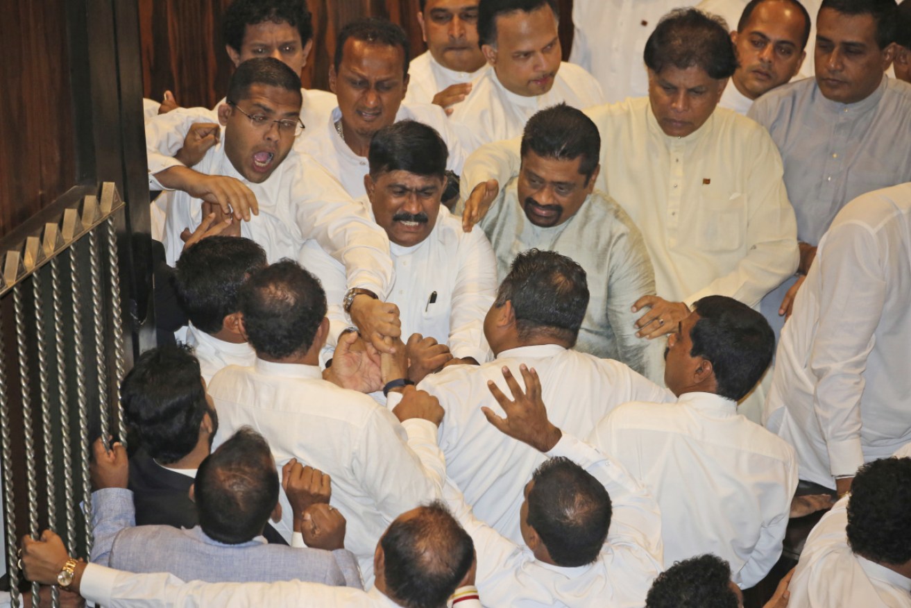 Rival lawmakers exchanged blows in Sri Lanka's Parliament on Thursday. 