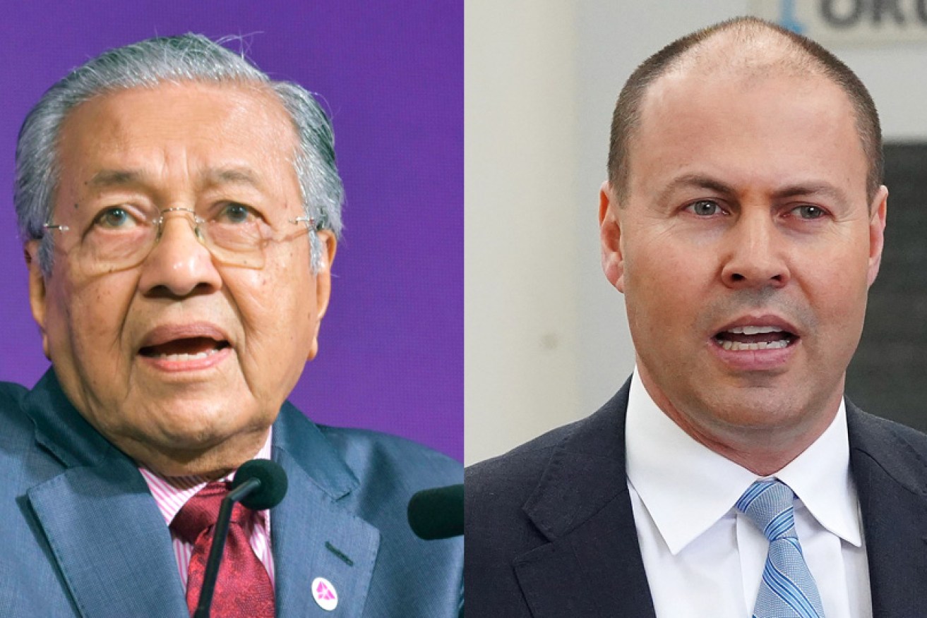 The row over Australia's embassy in Israel has escalated, with a spat between Treasurer Josh Frydenberg (right) and Malaysian PM Mahathir Mohamad.