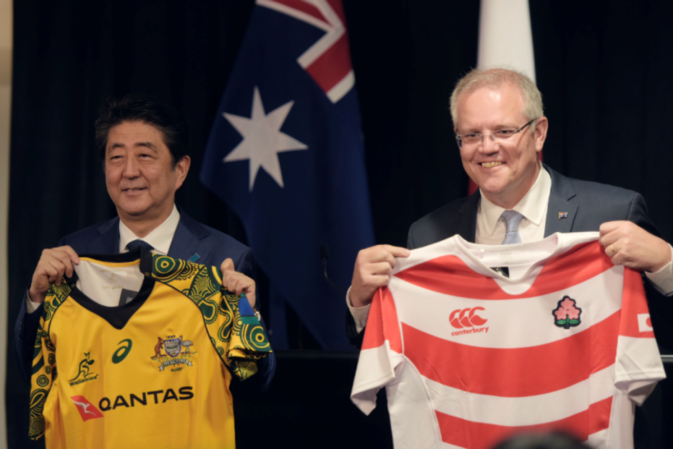 Japanese leader Shinzo Abe and Australia's Scott Morrison beg to differ about their national rugby squads, but on trade they're on the same team.