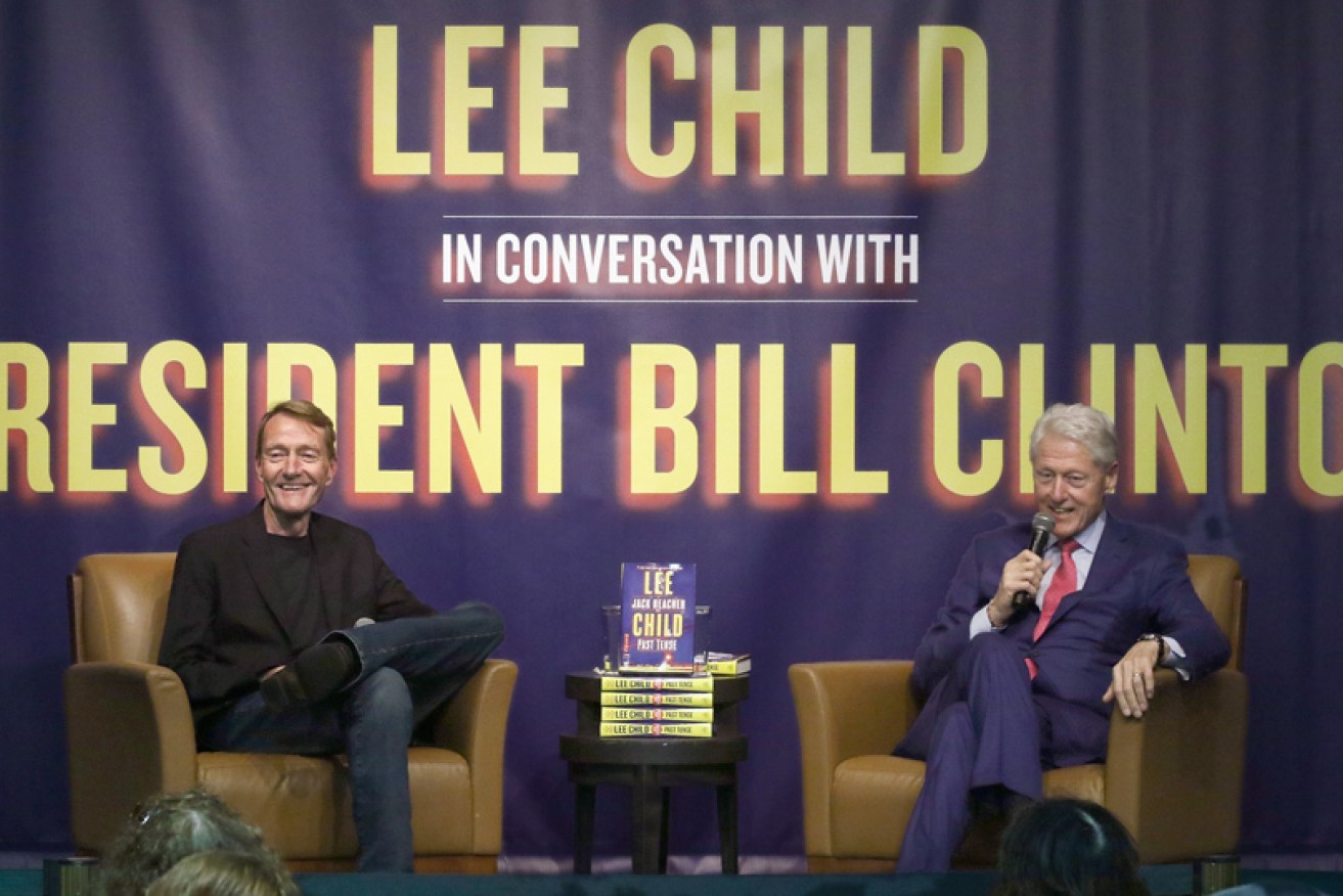 Author Lee Child at a <i>Past Tense</i> event with Reacher fan, former president Bill Clinton, in New York on November 5.
