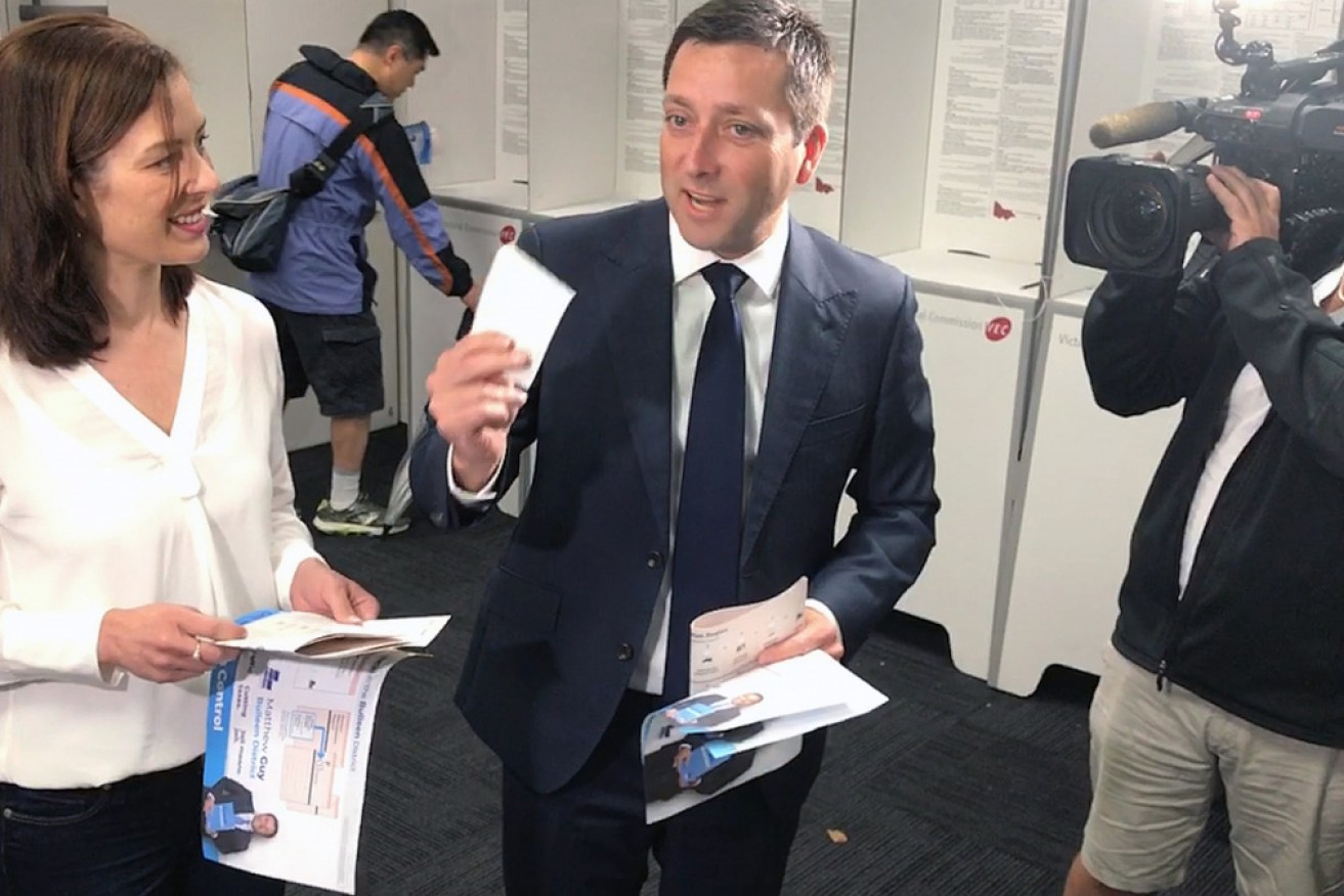 Opposition Leader Matthew Guy is pictured with his wife Renae casting early votes at pre-polling before the November 24 election.