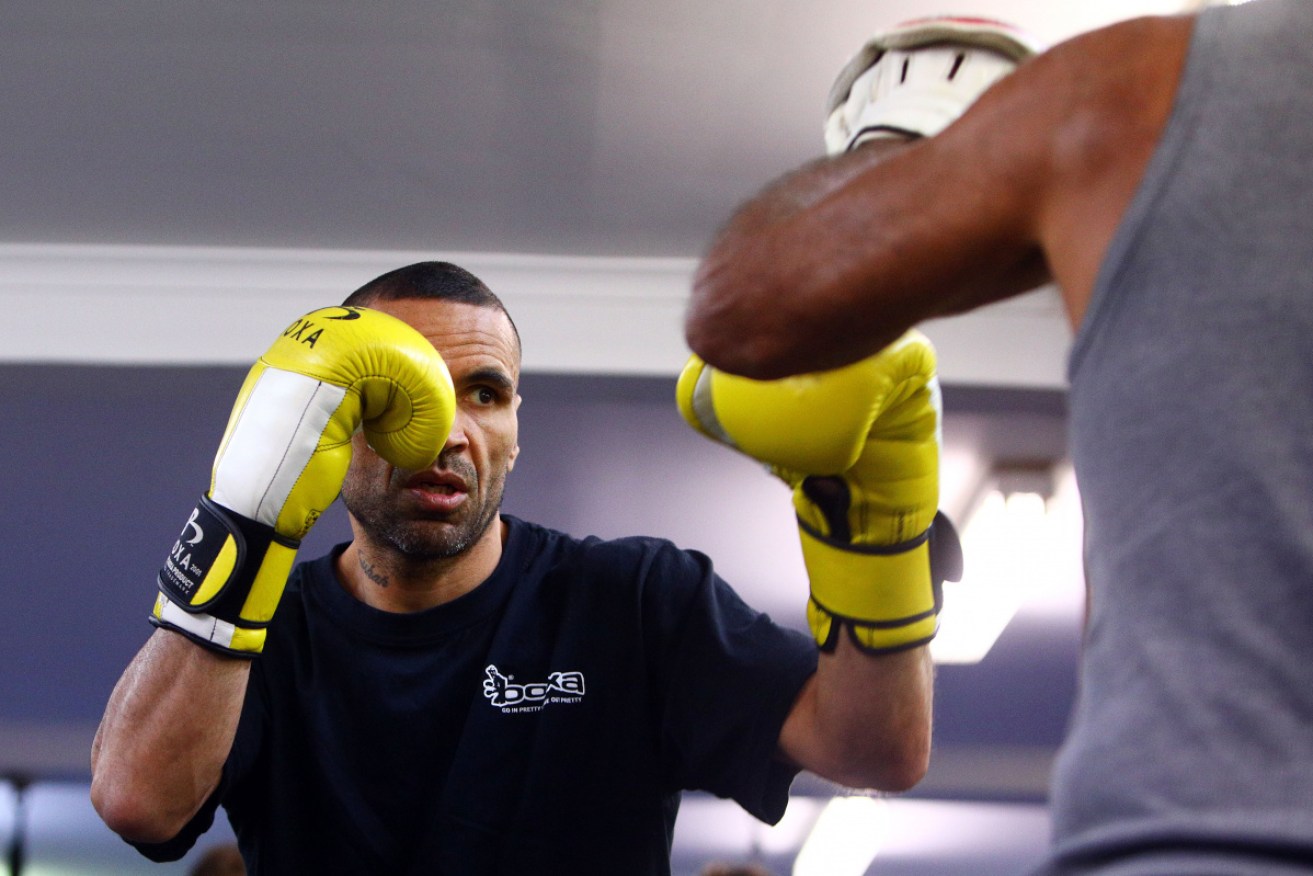 Anthony Mundine spars with his father Tony before Friday night's farewell fight. 