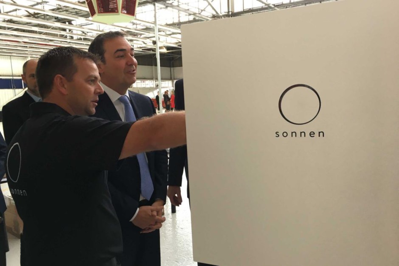 Adam Williams (left) showcases the Sonnen battery to South Australian Premier Steven Marshall.

