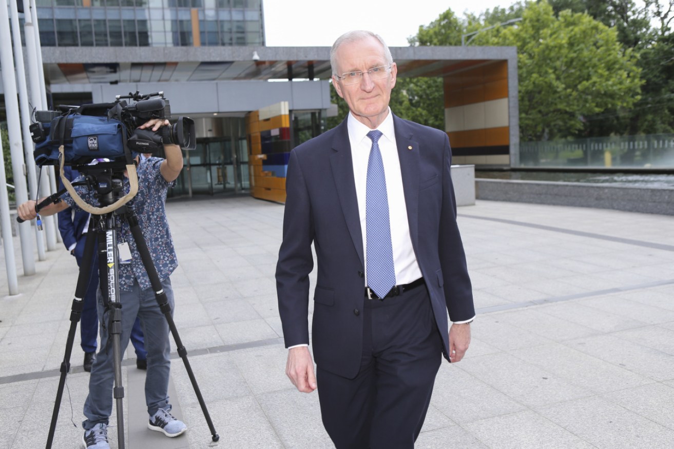 AMP's acting CEO Mike Wilkins leaves the Banking Royal Commission in Melbourne on Tuesday.